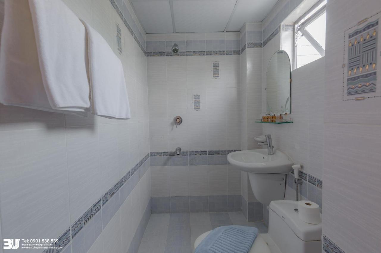 הו צ'י מין סיטי Cosmo Square Hotel מראה חיצוני תמונה