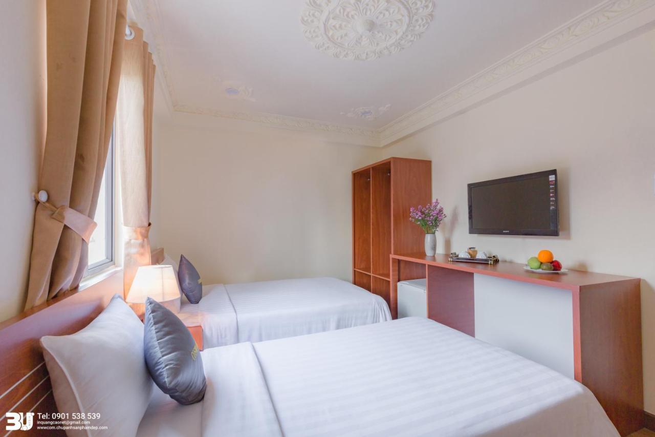 הו צ'י מין סיטי Cosmo Square Hotel מראה חיצוני תמונה